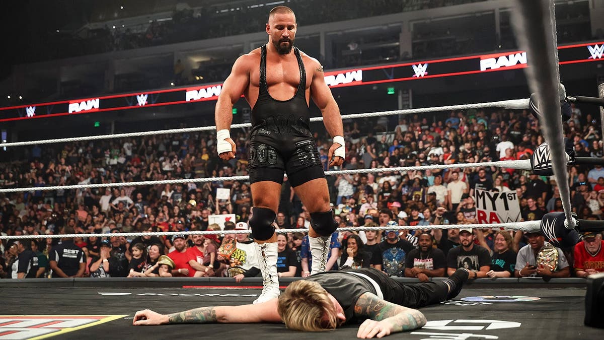 Bron Breakker stands over Matt Mathews during Monday Night Raw at Legacy Arena in Birmingham, Ala.