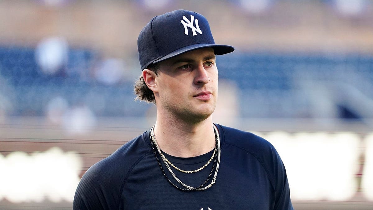 Cam Schlittler #31 of the New York Yankees looks on before the game at Petco Park.