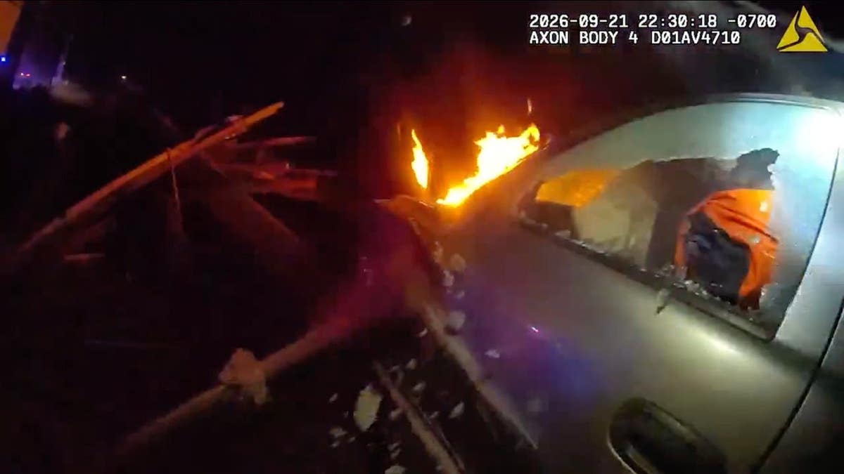 Sheriff's deputy breaks car window