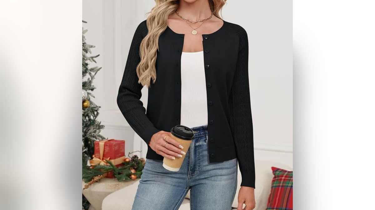The button-up cardigan has a soft knit feel and a classic crew neck.