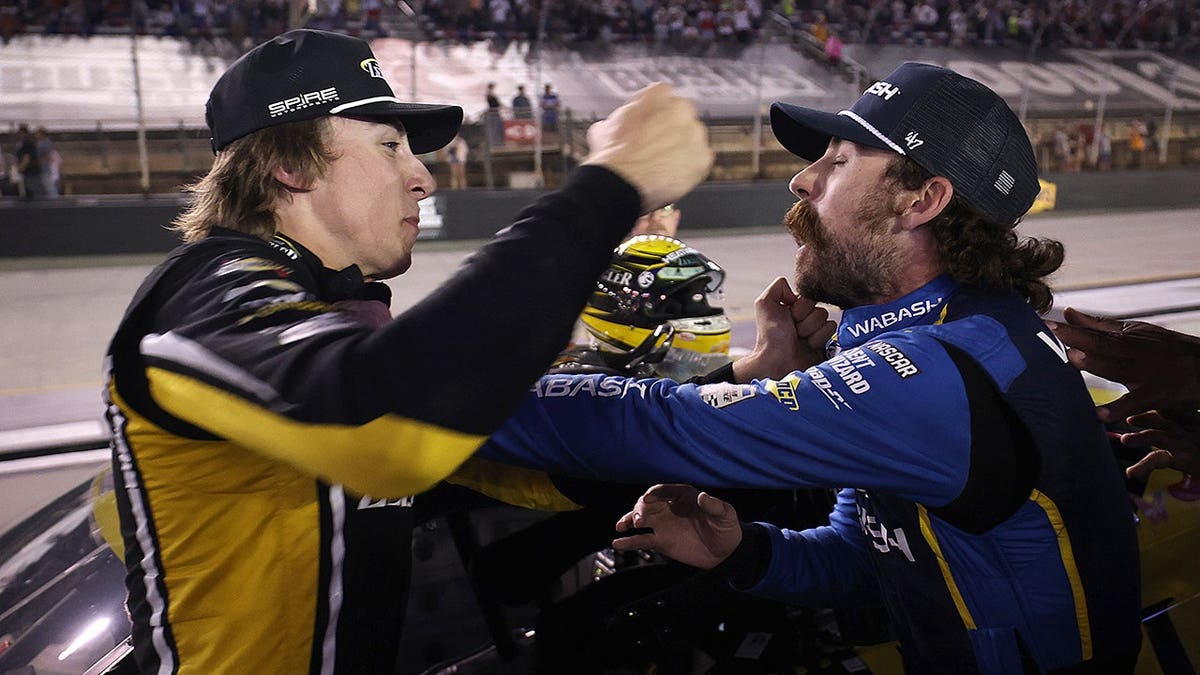 Carson Hocevar and Ryan Blaney argue after a NASCAR Cup Series race at Bristol Motor Speedway.