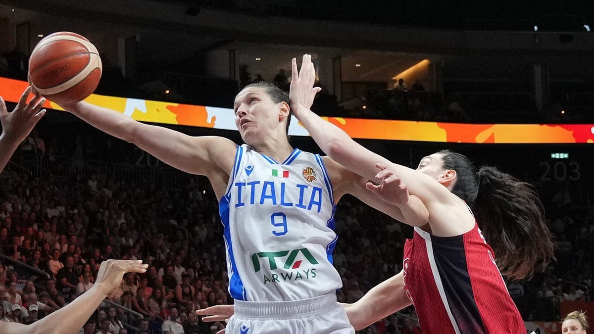 Cecilia Zandalasini rebounds during the Women's Basketball World Cup match in Berlin.