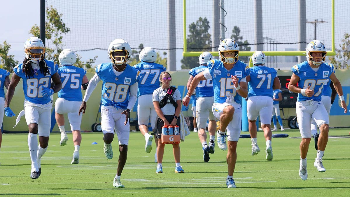 JaQuae Jackson, Sincere Brown, Ladd McConkey and Luke Grimm run sprints during Los Angeles Chargers training camp.