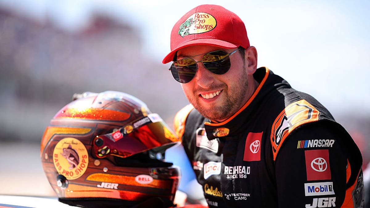 Chase Briscoe enters his car during qualifying at Darlington Raceway.