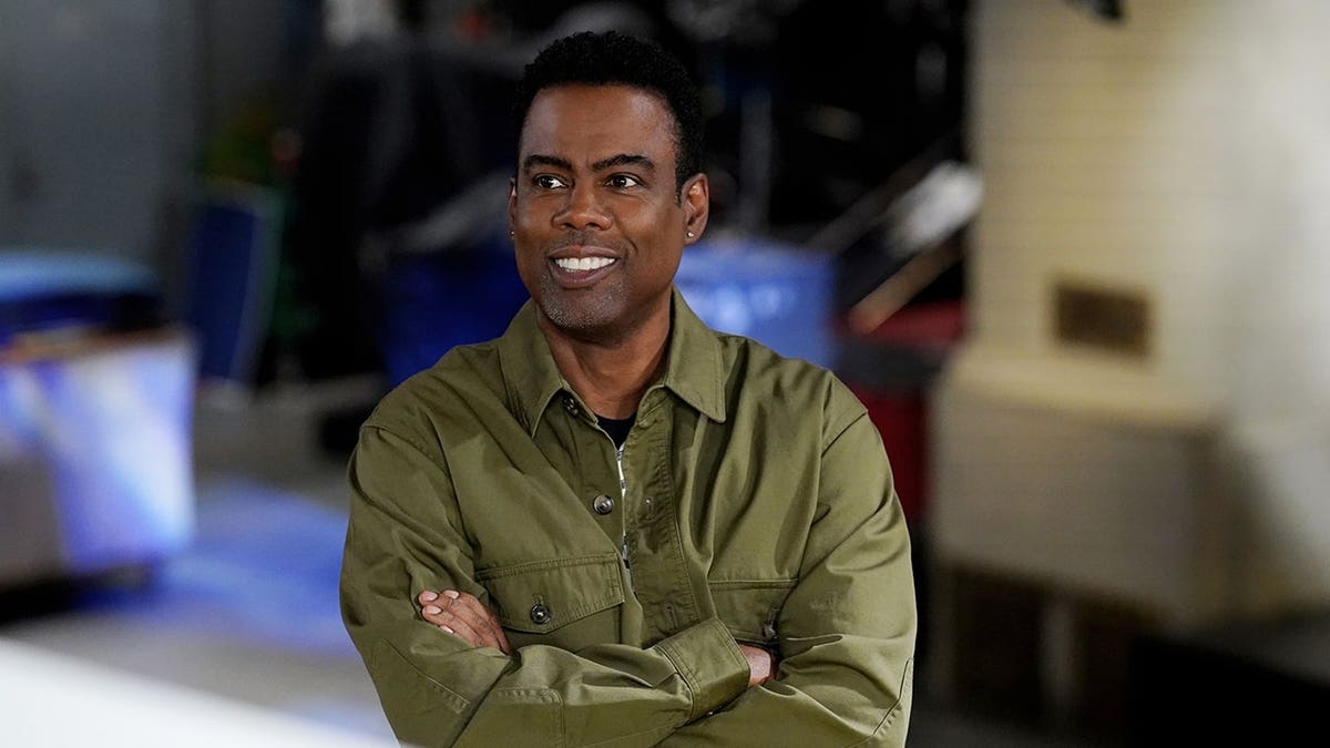 Chris Rock stands in Studio 8H during promos.