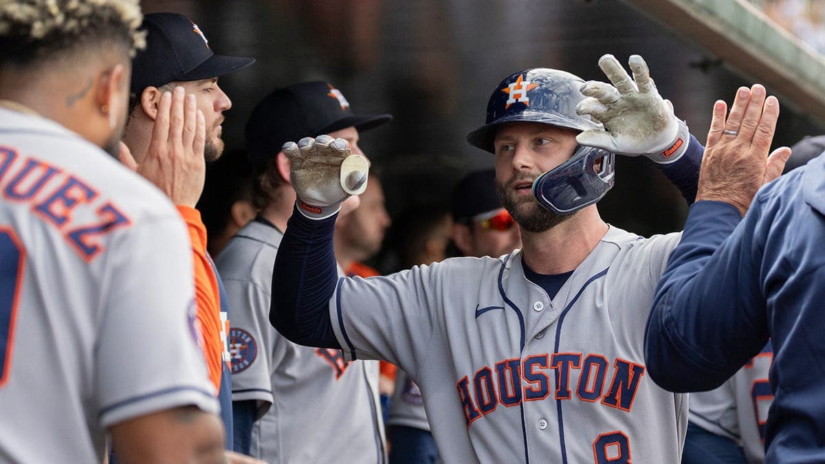 Christian Walker celebrates after hitting a home run during a baseball game in West Sacramento, Calif.