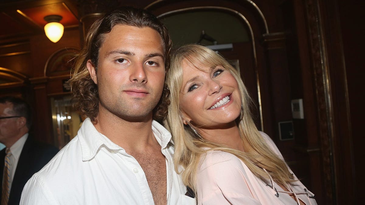 Christie Brinkley poses with son Jack Paris Brinkley Cook at Broadway opening-night arrivals.