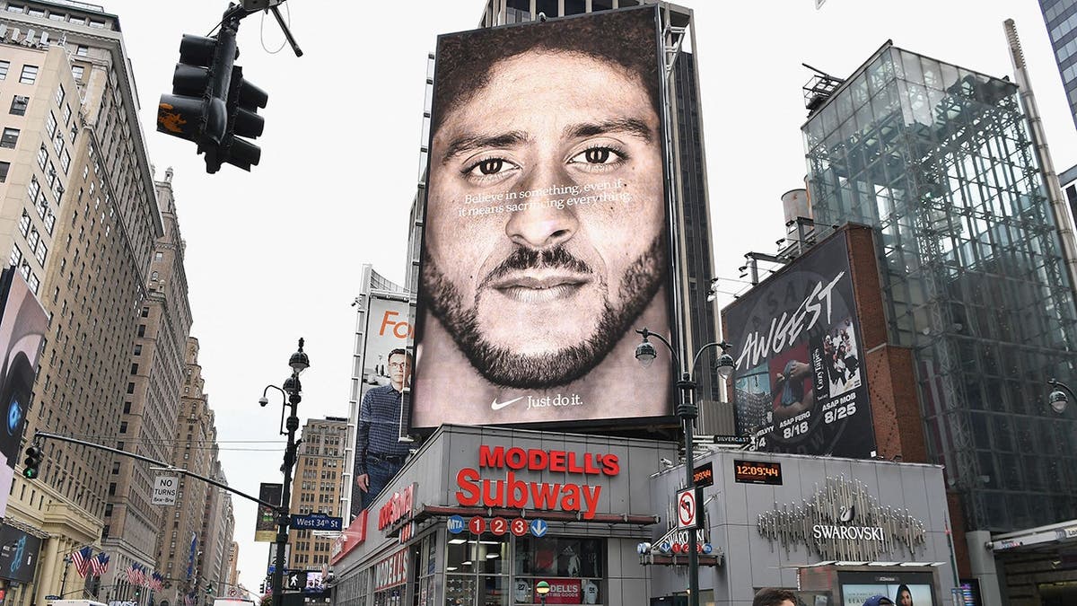 Colin Kaepernick Nike ad displayed on a wall in New York City.