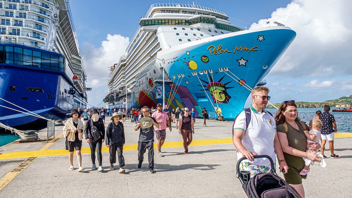Cruise passengers disembark from ships at Great Bay in Philipsburg, Sint Maarten.