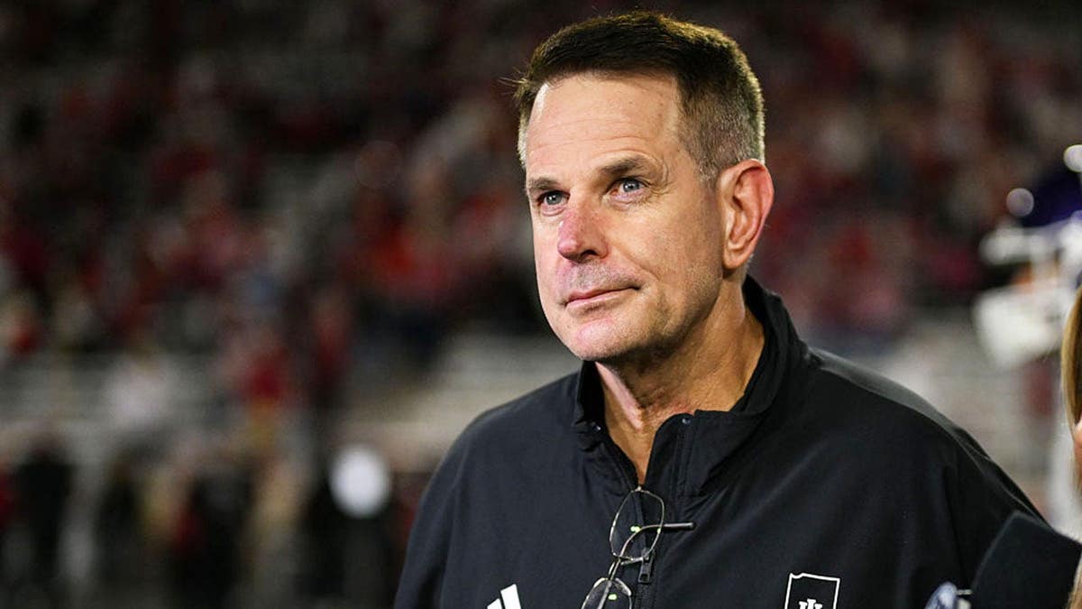 Curt Cignetti stands following a college football game at Memorial Stadium in Bloomington, Ind.
