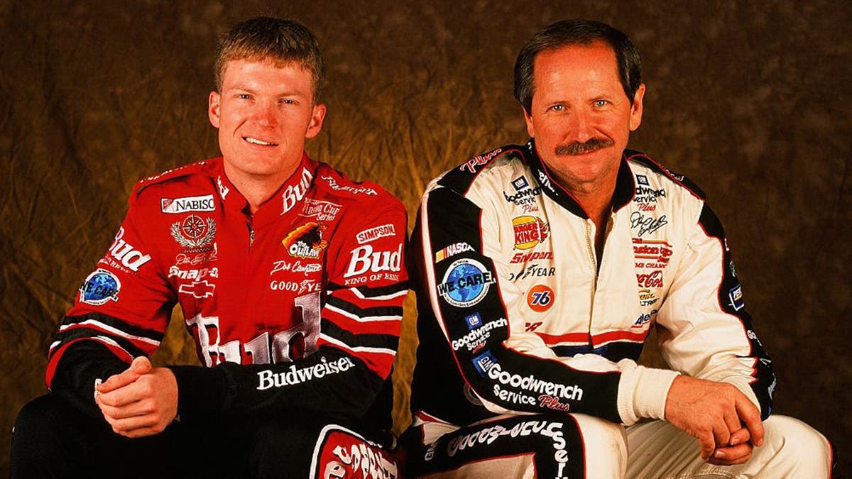 Dale Earnhardt and Dale Earnhardt Jr. pose together in Mooresville, North Carolina.
