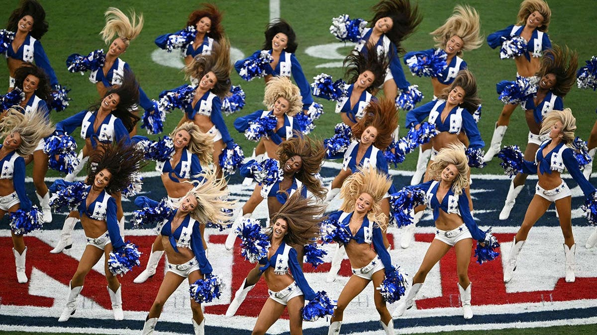 Dallas Cowboys cheerleaders perform at Maracana Stadium in Rio de Janeiro, Brazil.