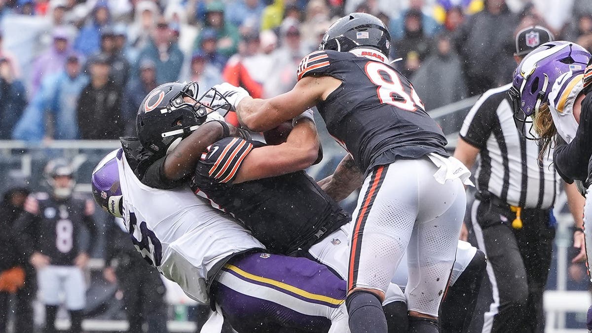 Dallas Turner sacks Tyson Bagent during a game at Soldier Field.