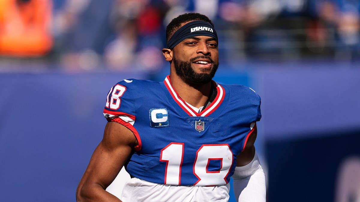Darius Slayton runs onto the field at MetLife Stadium.