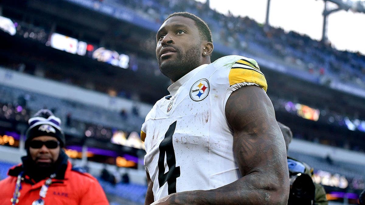 D.K. Metcalf walks off the field at M&T Bank Stadium.
