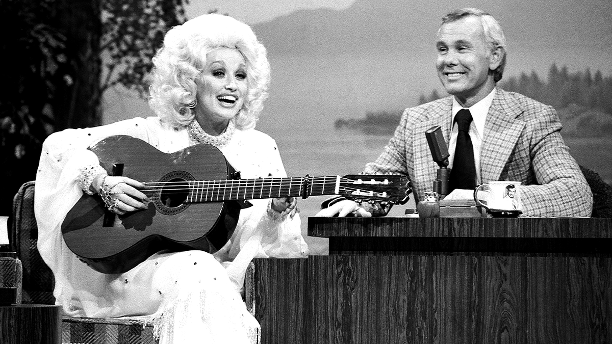 Dolly Parton appears with Johnny Carson on