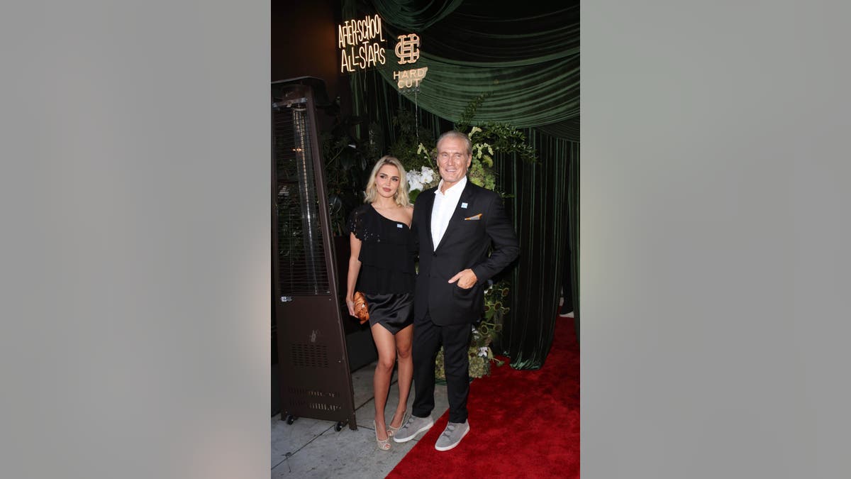 Dolph Lundgren and Emma Krokdal at charity event