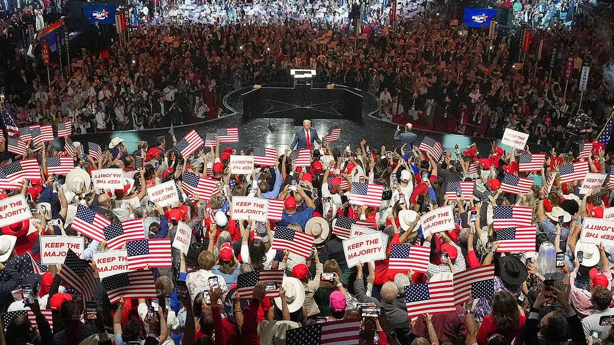 President Donald Trump greets the audience at the Republican convention in Dallas.