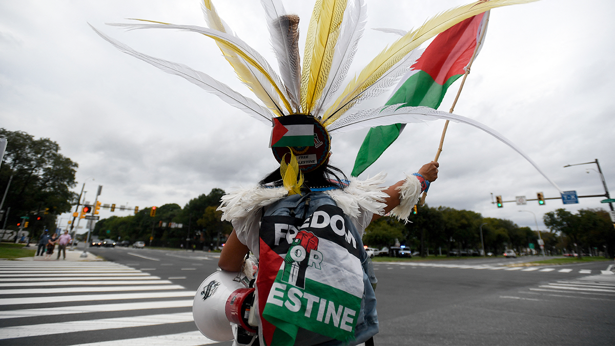 Pro-Palestinian protesters demonstrate near Lincoln Financial Field ahead of Ed Sheeran's concert in Philadelphia, Pennsylvania, on September 19, 2026, following the removal of rapper Macklemore from Sheeran's US tour.