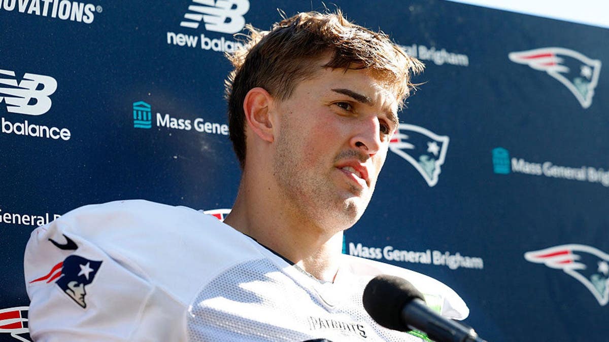 Eli Raridon speaks to reporters after practice at Gillette Stadium.