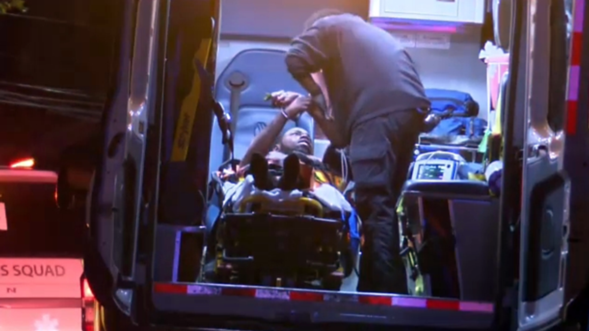 Elijah Hemingway loaded into an ambulance