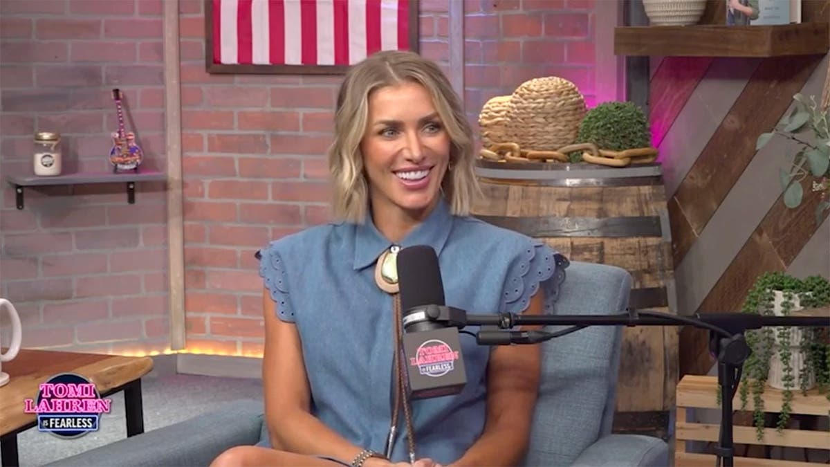 Eva Shockey sits on the set of