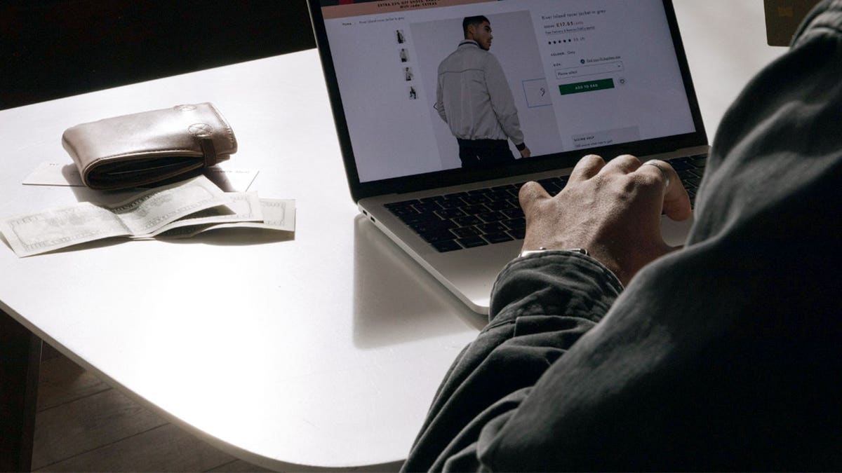 A person views an online store.