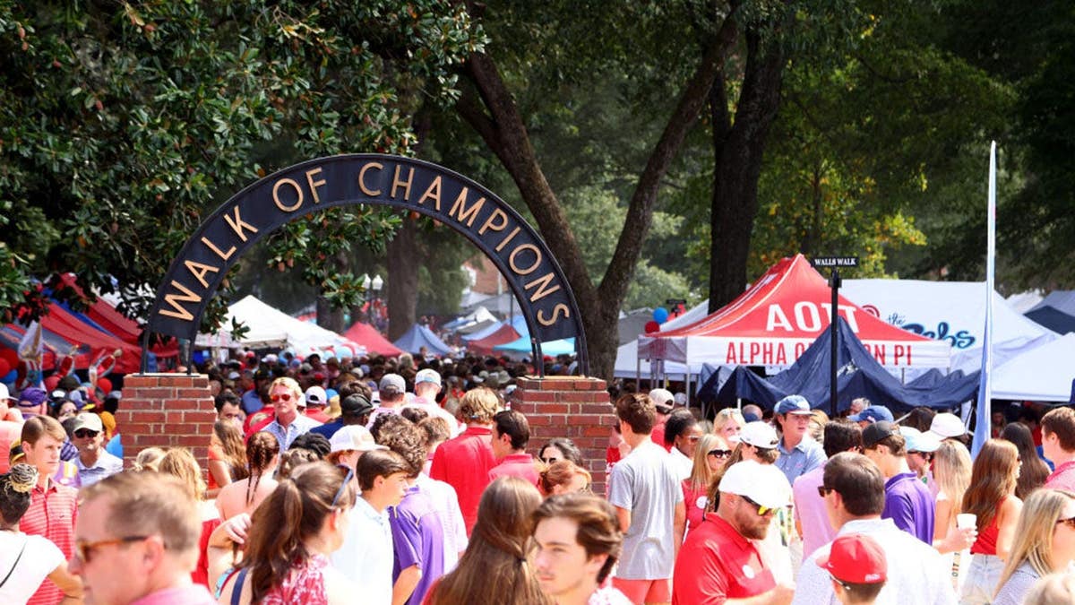 Fans tailgate at The Grove near Vaught-Hemingway Stadium in Oxford, Mississippi.