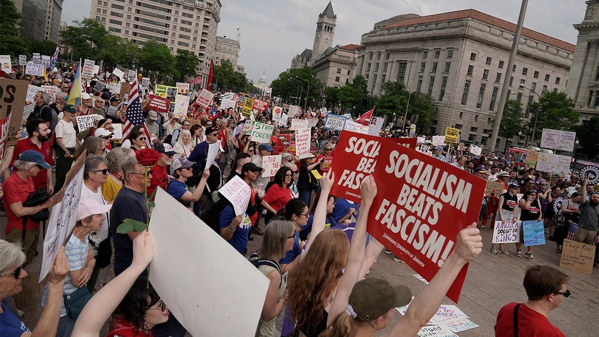 People gather at Freedom Plaza during a May Day demonstration in Washington, D.C.