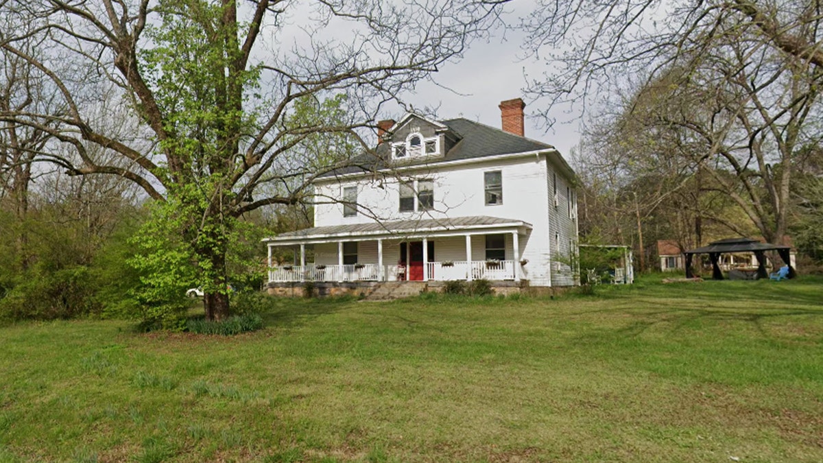 two story house with large yard