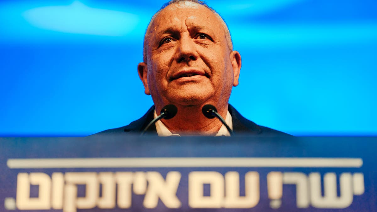 Gadi Eisenkot, leader of the Yashar party, speaks from behind a podium with a banner reading "Yashar with Eisenkot" during an event presenting the party's full candidate list ahead of October's general election on Sept. 7, 2026 in Rosh HaAyin, Israel. Eisenkot, a retired chief of the Israel Defense Forces, has emerged as the foremost challenger to Prime Minister Benjamin Netanyahu. 
