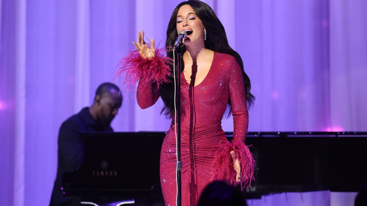 Kacey Musgraves in a purple gown