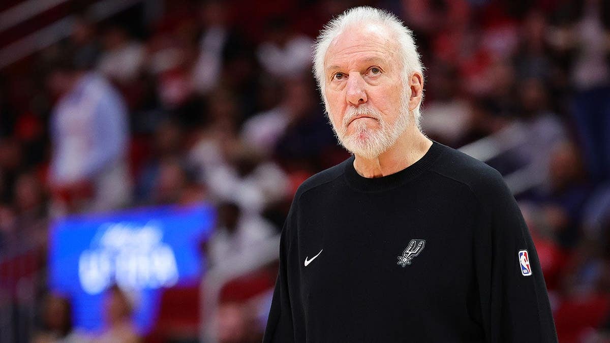 Gregg Popovich, head coach of the San Antonio Spurs, looks on during a preseason game.