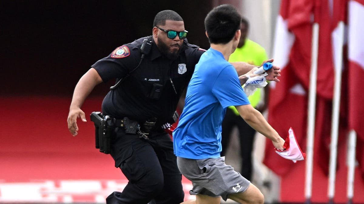 Houston cop and field invader
