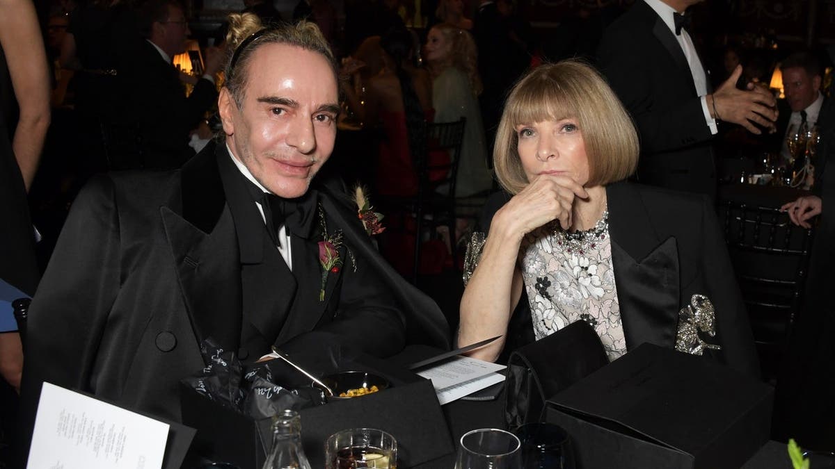 John Galliano and Anna Wintour attend a cocktail reception ahead of The Fashion Awards 2021.