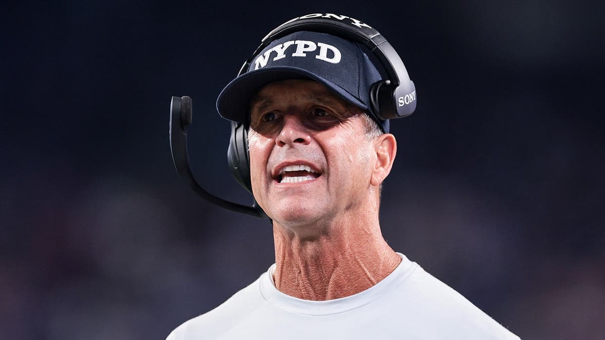 John Harbaugh reacts during the second quarter of a game at MetLife Stadium.