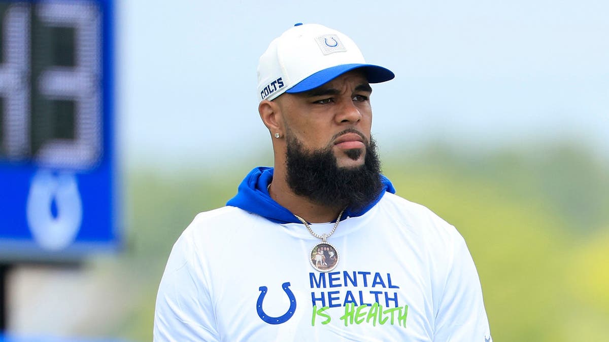 Keenan Allen looks on during joint practice against the Atlanta Falcons.