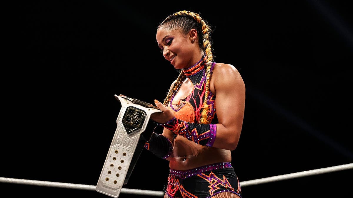 Kelani Jordan celebrates after winning the NXT Women's Championship at NXT Heatwave.