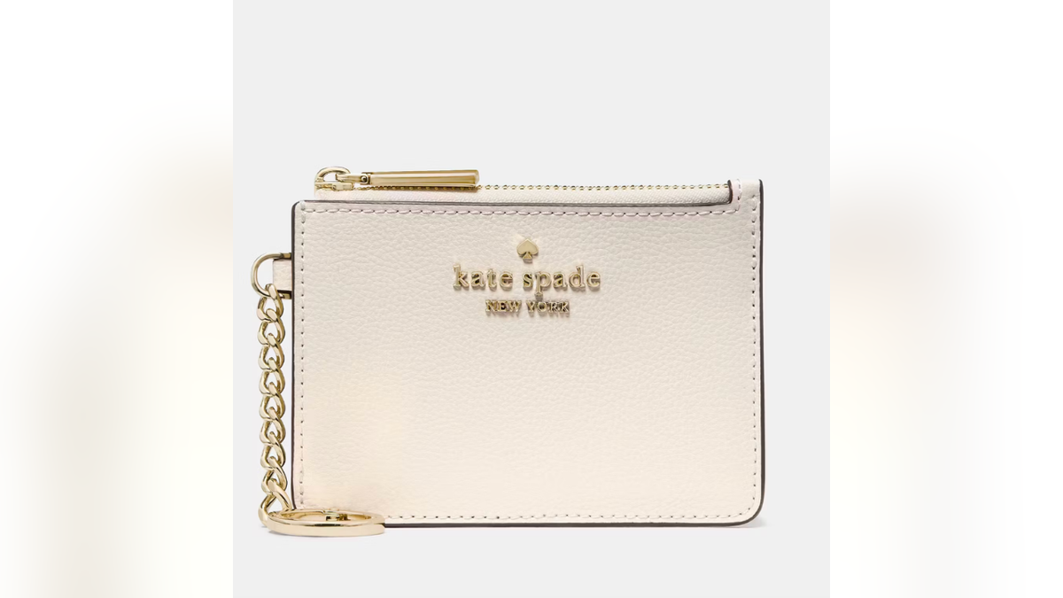 This pebbled leather Kate Spade card holder has an attached key ring.