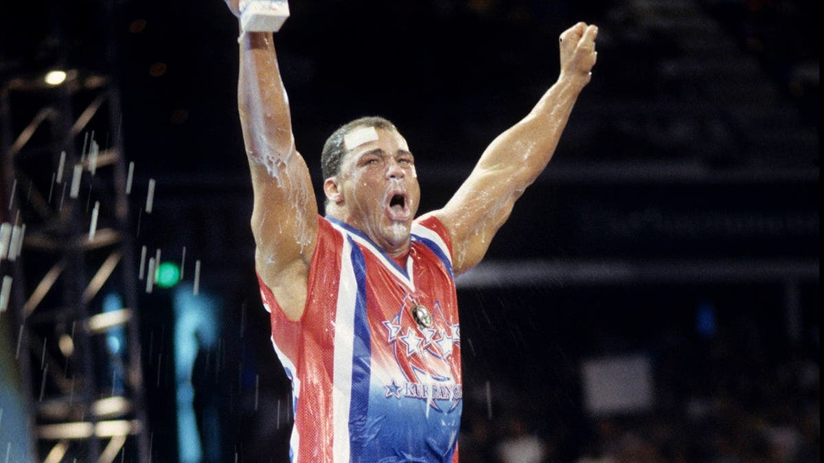 Kurt Angle poses on a milk truck during Monday Night RAW.