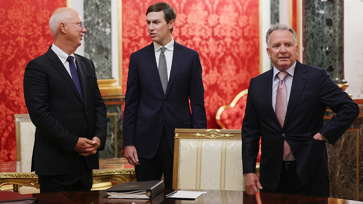 U.S. President Donald Trump's envoys Steve Witkoff, right, Jared Kushner, center, and Presidential Envoy Kirill Dmitriev stand prior to talks at the Senate Palace of the Kremlin in Moscow, on Saturday, Sept. 5, 2026. (Gavriil Grigorov/Sputnik/Kremlin Pool Photo via AP)