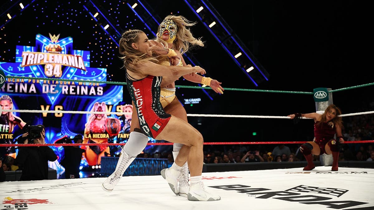 La Hiedra stands in the wrestling ring at MGM Grand Garden Arena.