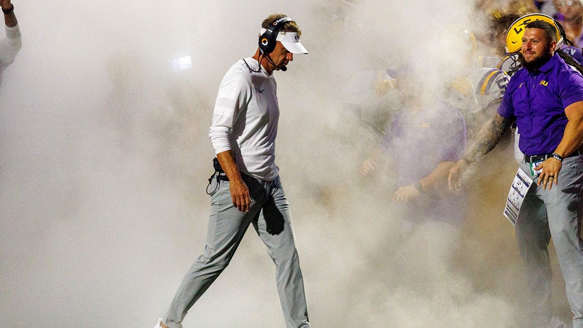 LSU head coach Lane Kiffin looks on from the sideline during a game against Clemson.