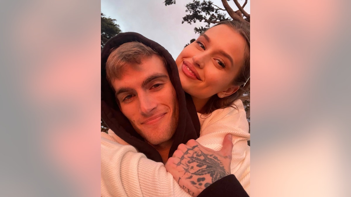 Lexi Wood with her arms around Presley Gerber