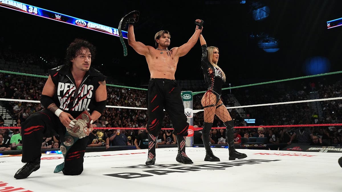 Wrestlers perform in the ring at MGM Grand Garden Arena during Triplemania 34.