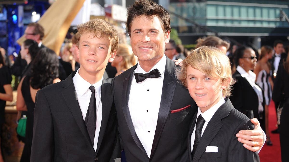 Rob Lowe and his sons Matthew Edward and John Owen arrive at the 61st Primetime Emmy Awards.