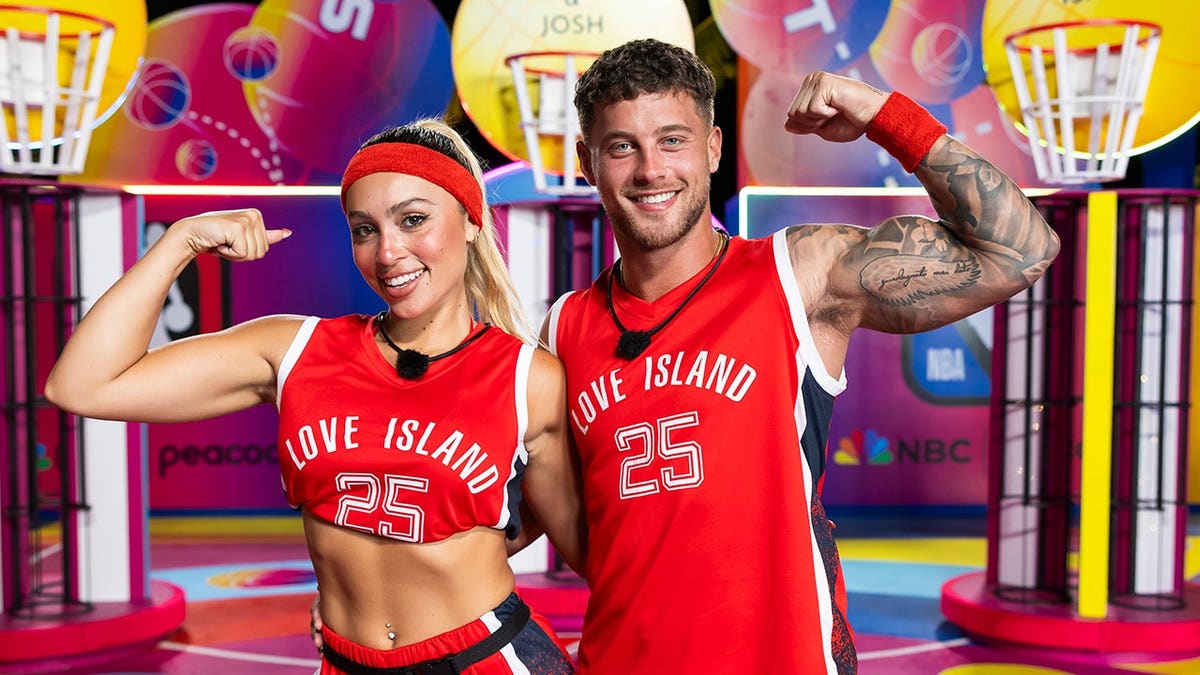 Andrea Carmona and Josh Goldstein stand together on Love Island Games.