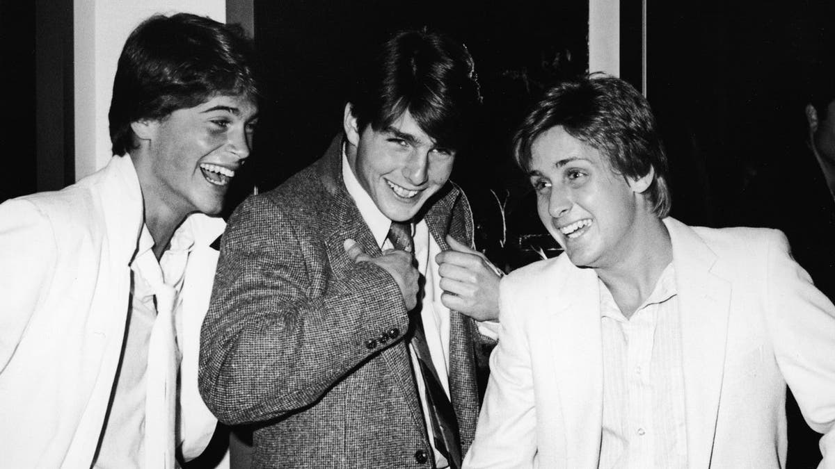 Rob Lowe, Tom Cruise and Emilio Estevez at a premiere screening in Beverly Hills.
