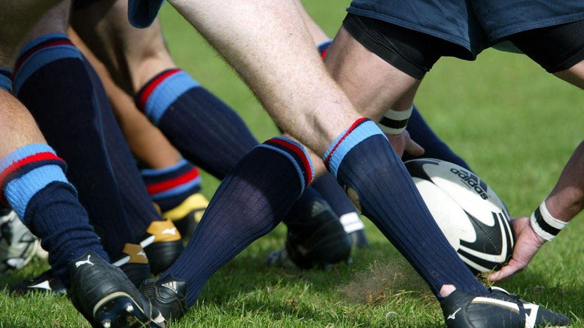Rugby players clear the ball from a ruck during a club match between Marist and Takapuna.