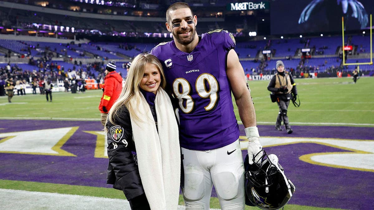 Mark Andrews poses with girlfriend Elena Yates after Ravens defeat Steelers.